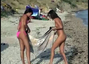 Topless teens at beach